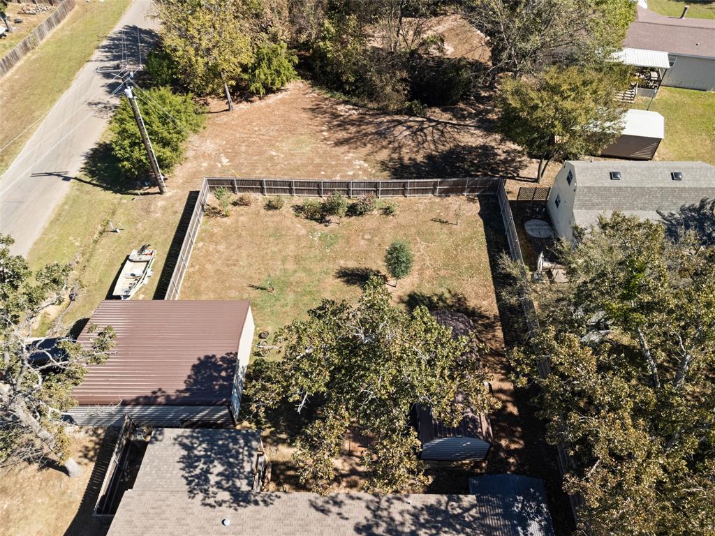 454 Geronimo Quitman, TX 75783 - Photo 5 of 37 an aerial view of a house with a yard