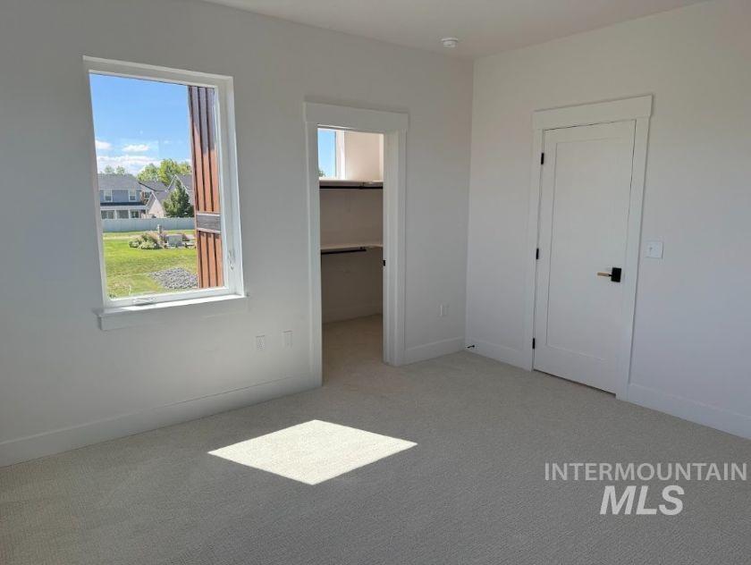 755 West Wrangler Street Meridian, ID 83646 - Photo 19 of 35 Neutral tone-on-tone carpeting