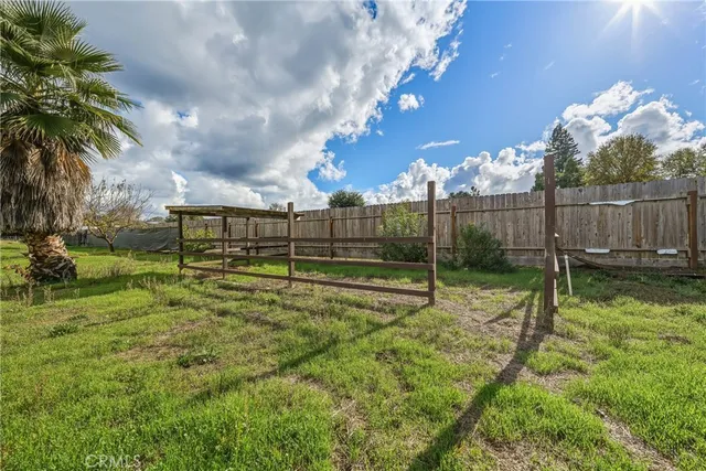a view of backyard with green space