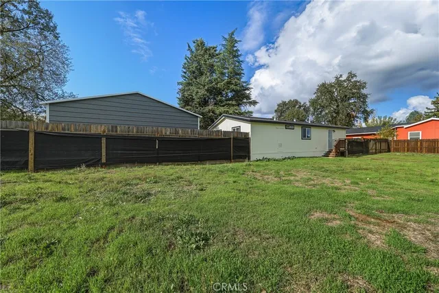 a house view with a garden space