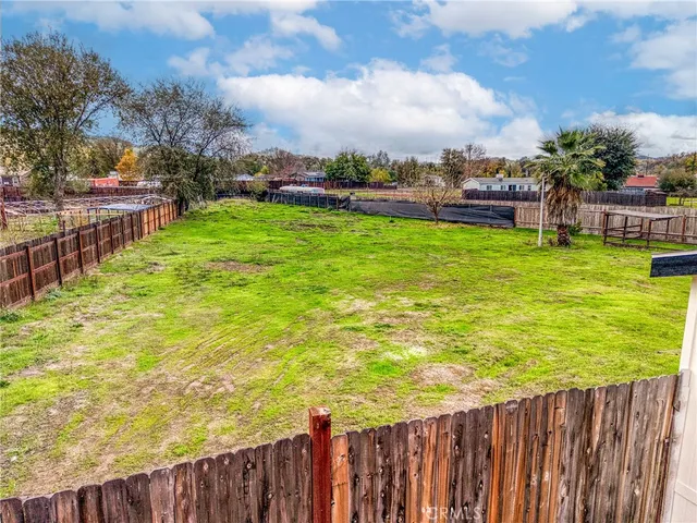 a view of a garden with houses