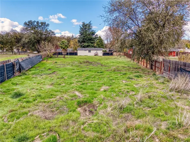 a view of a backyard with a garden