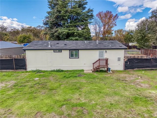 a house view with a garden space