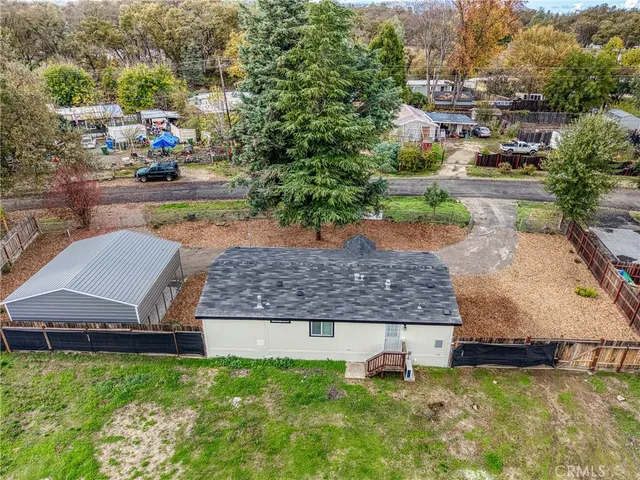 an aerial view of a house with garden