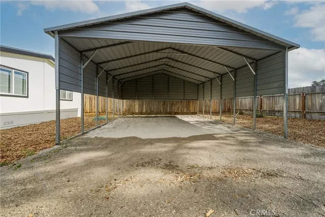 a front view of a house with a garage