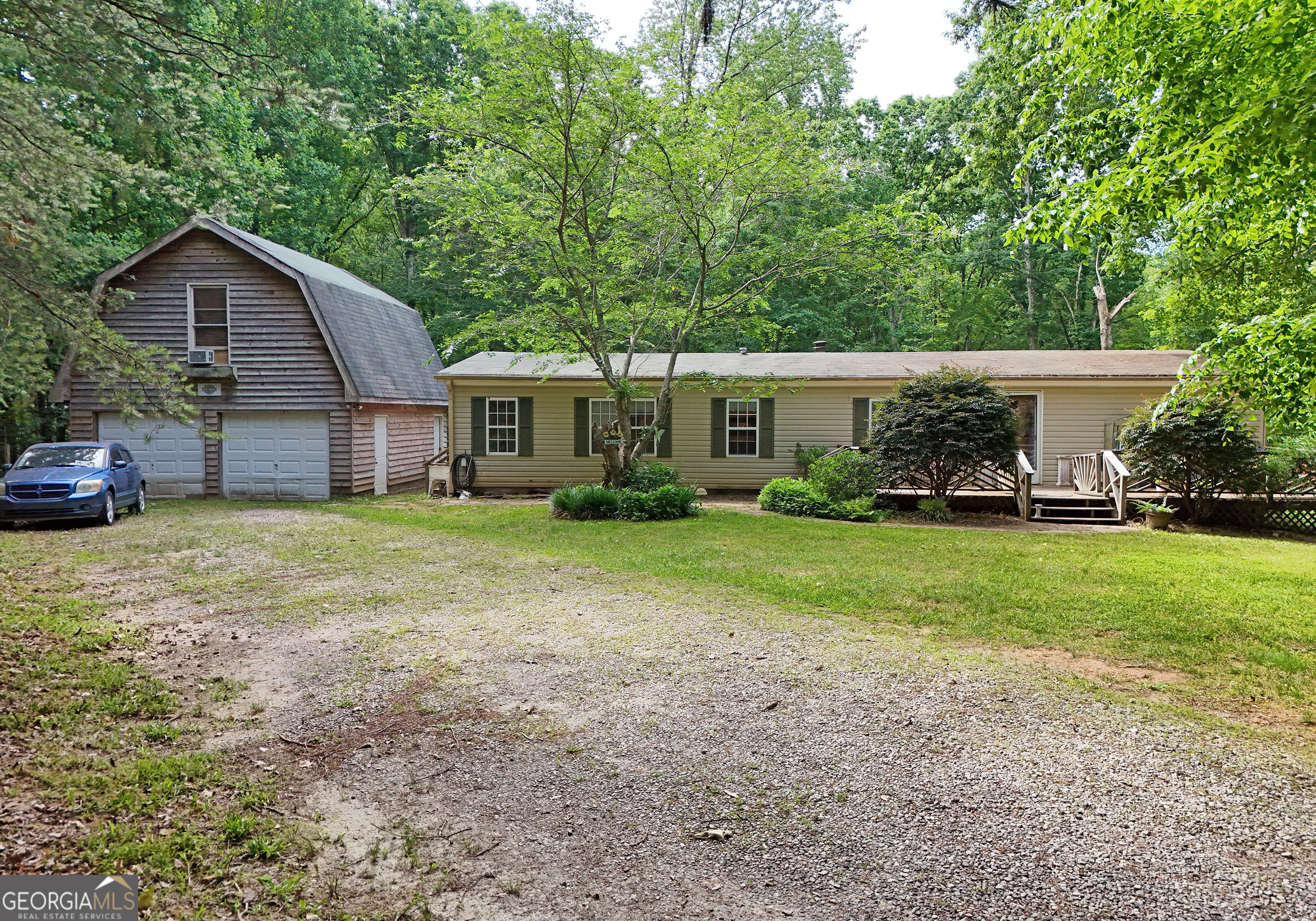 100 Garden Terrace, Unit 9 Dahlonega, GA 30533 - Photo 1 of 1 a view of a house with backyard