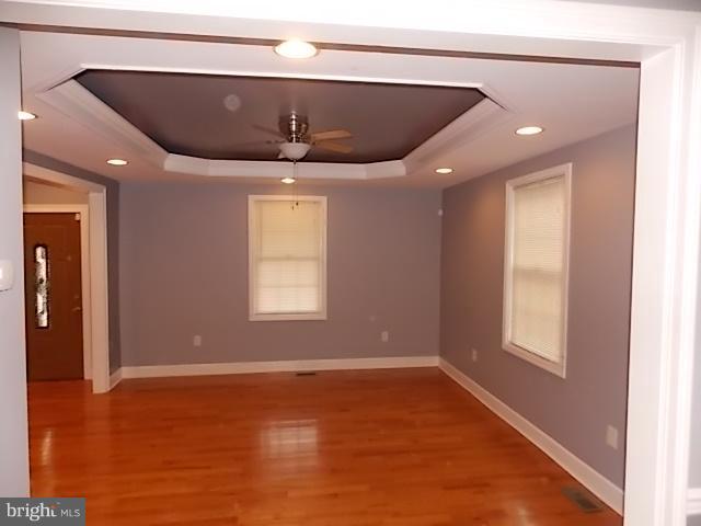 5501 Pilgrim Road Baltimore, MD 21214 - Photo 8 of 21 Living Room with Tray Ceiling