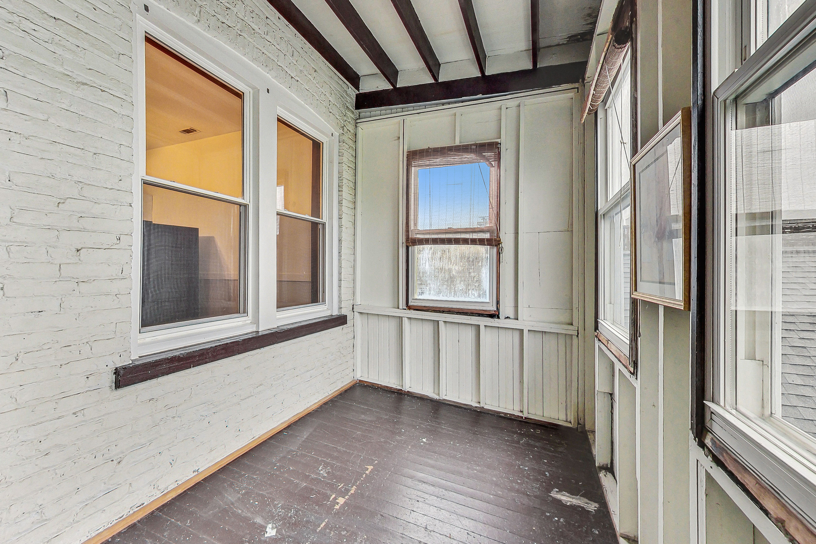 1312 West Nelson Street, Unit 3 Chicago, IL 60657 - Photo 13 of 15 a view of an empty room with a window