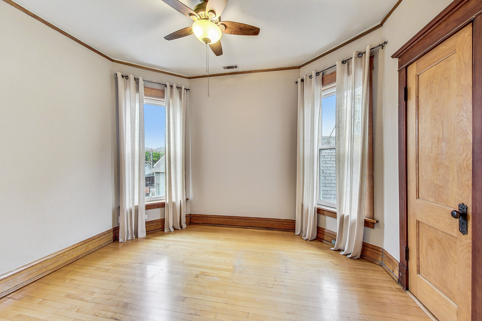 1312 West Nelson Street, Unit 3 Chicago, IL 60657 - Photo 8 of 15 a view of entryway with wooden floor