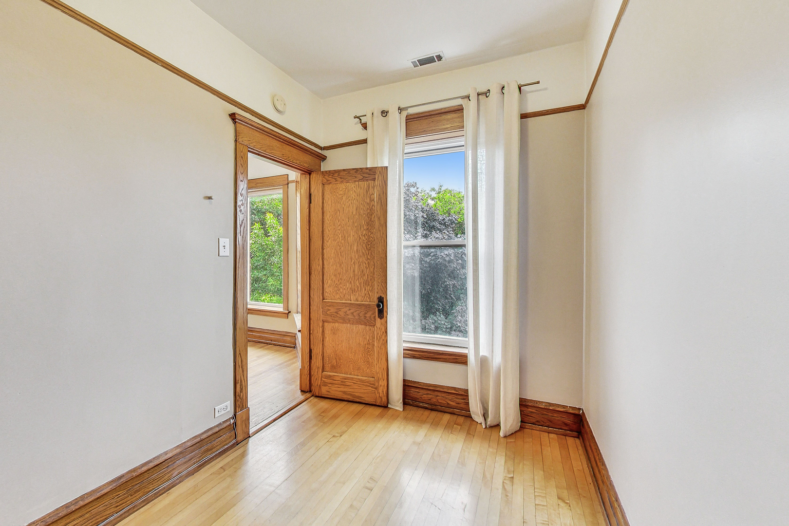 1312 West Nelson Street, Unit 3 Chicago, IL 60657 - Photo 10 of 15 a view of front door with wooden floor