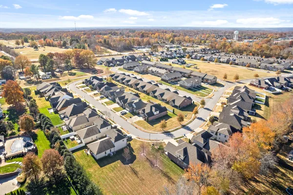 an aerial view of residential building with parking space