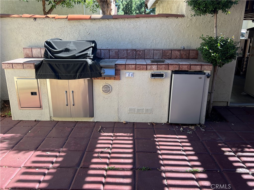 525 San Marcos Road San Dimas, CA 91773 - Photo 11 of 22 a view of a backyard of a house with wooden floor