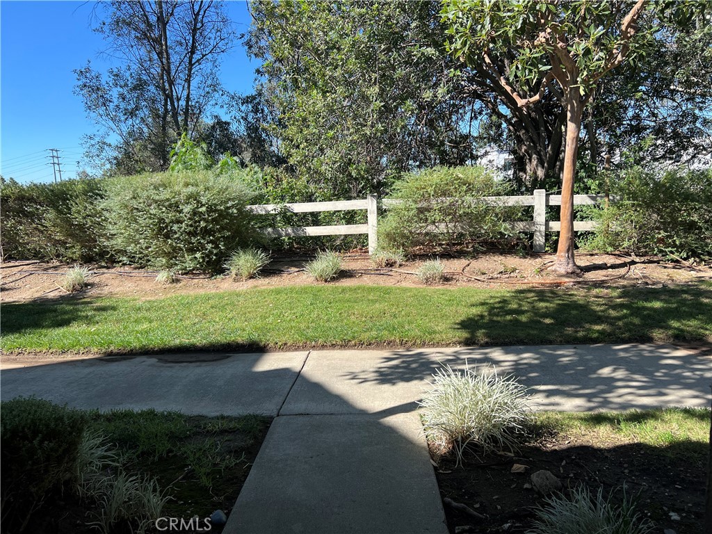 525 San Marcos Road San Dimas, CA 91773 - Photo 2 of 22 a view of a street with a yard and large trees
