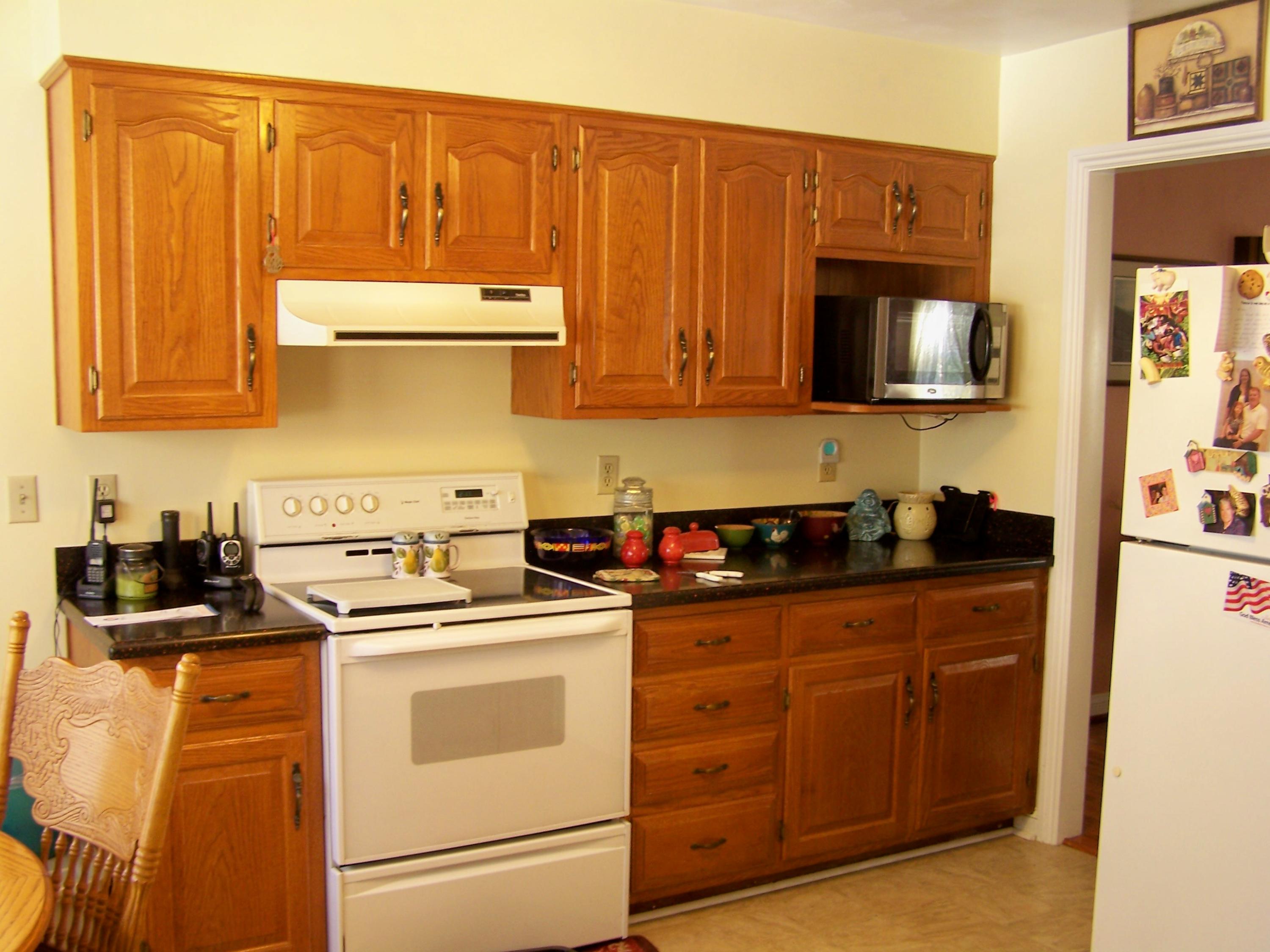 3813 Naff Road Boones Mill, VA 24065 - Photo 8 of 29 Nice Oak Cabinets w/ Corian Countertops