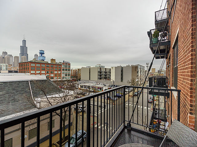 106 North Aberdeen Street, Unit 4B Chicago, IL 60607 - Photo 13 of 17 a view of city from balcony
