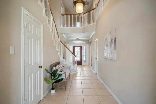 a view of entryway with livingroom and hallway