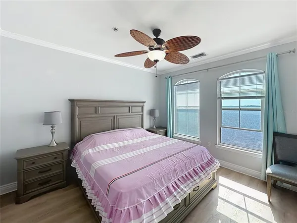 a front view of a house with a garden and a yard