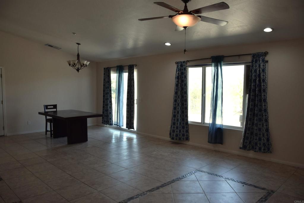 2527 Flying U Road Borrego Springs, CA 92004 - Photo 7 of 12 a living room with furniture and a chandelier