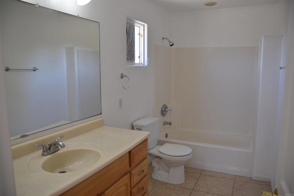 2527 Flying U Road Borrego Springs, CA 92004 - Photo 9 of 12 a bathroom with a sink toilet and shower