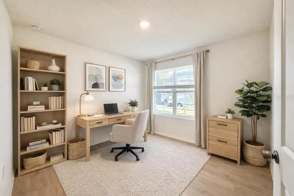 a workspace with furniture and window