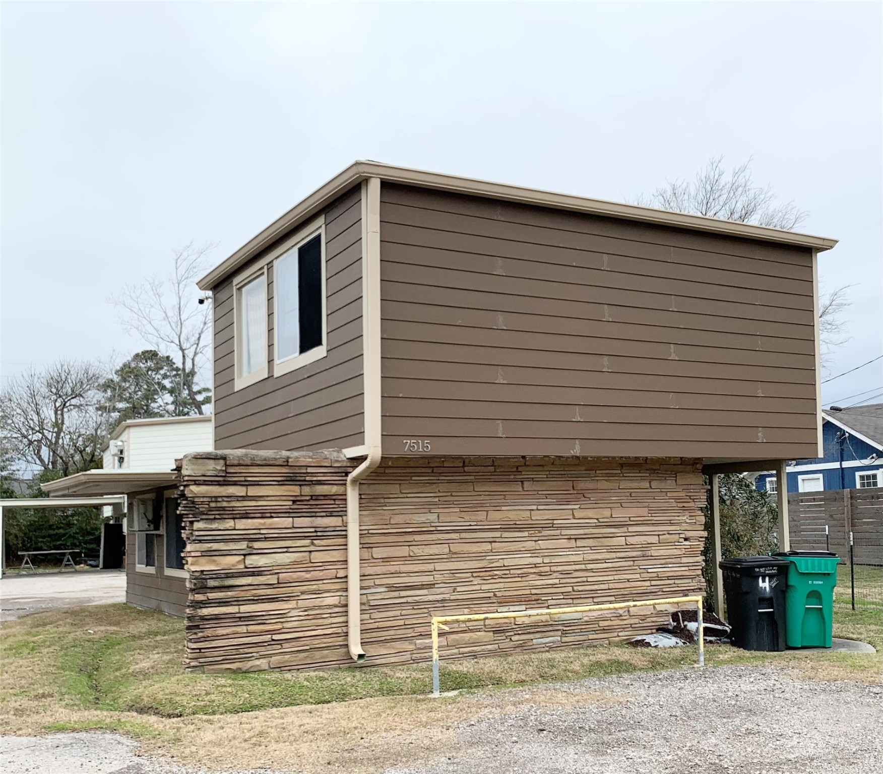 7515 Bayway Drive, Unit 5 Baytown, TX 77520 - Photo 11 of 11 a front view of a house with parking