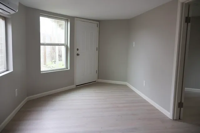 an empty room with windows
