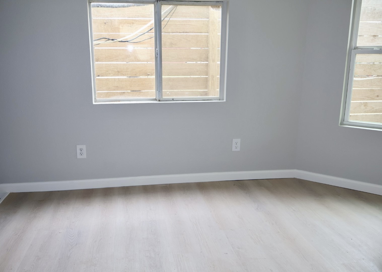 7515 Bayway Drive, Unit 5 Baytown, TX 77520 - Photo 4 of 11 an empty room with a window