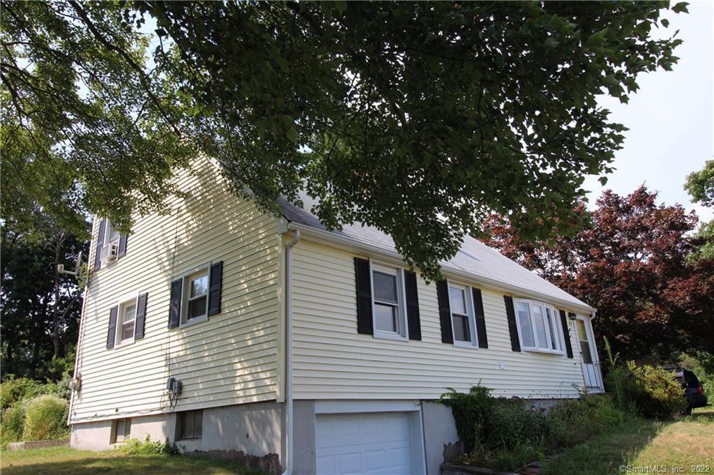 25 Hillside Road Cromwell, CT 06416 - Photo 1 of 1 a view of a white house next to a tree