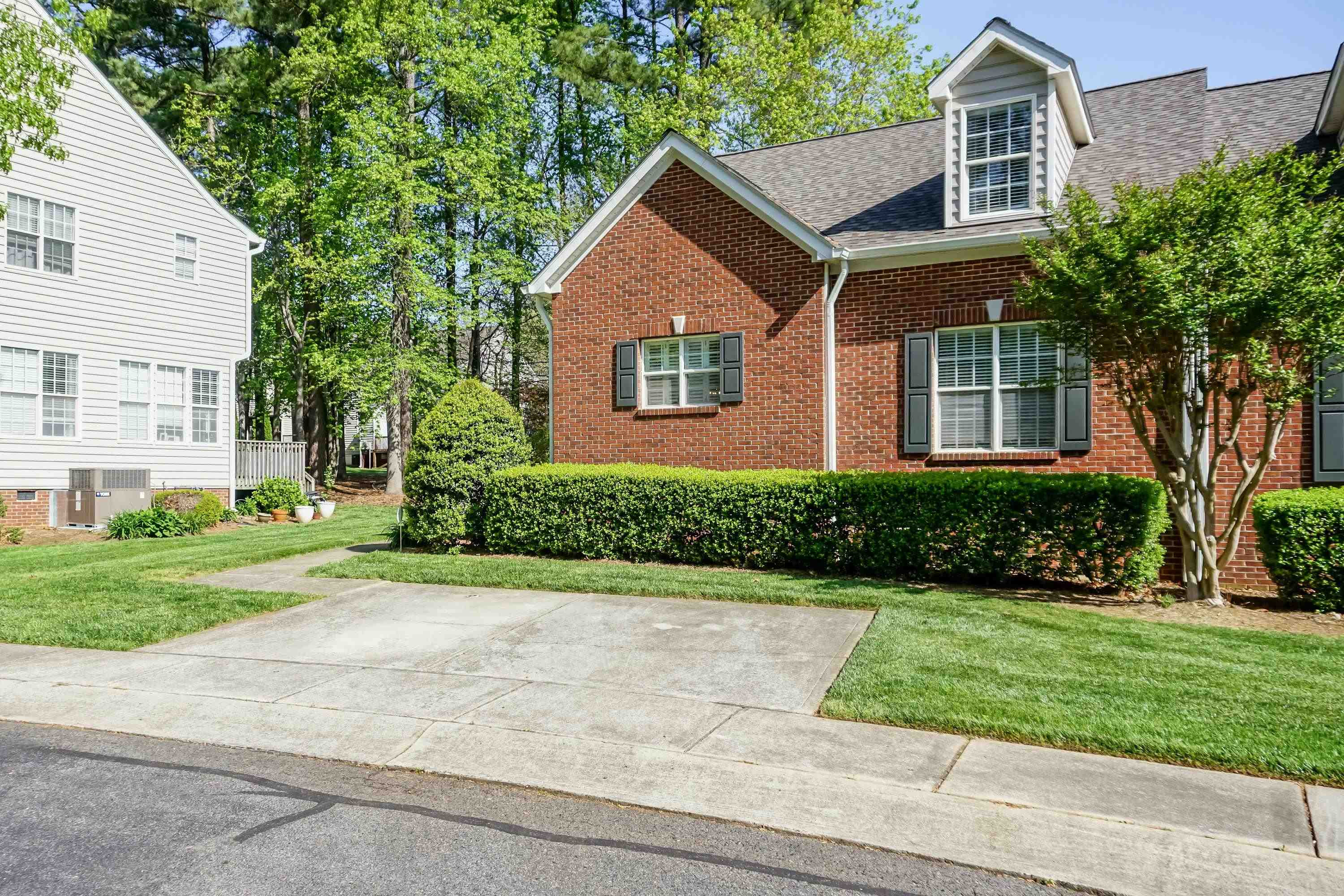 5632 Picnic Rock Lane Raleigh, NC 27613 - Photo 3 of 32 Partial Brick Front with 2 parking spaces. Exterior Front