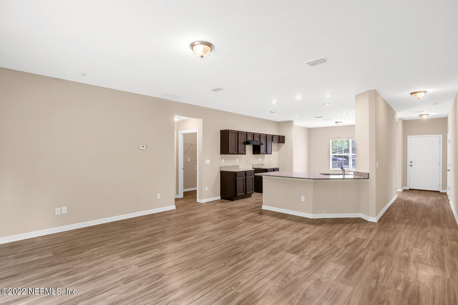 2410 Leon Road Jacksonville, FL 32246 - Photo 5 of 20 Living Room to Kitchen