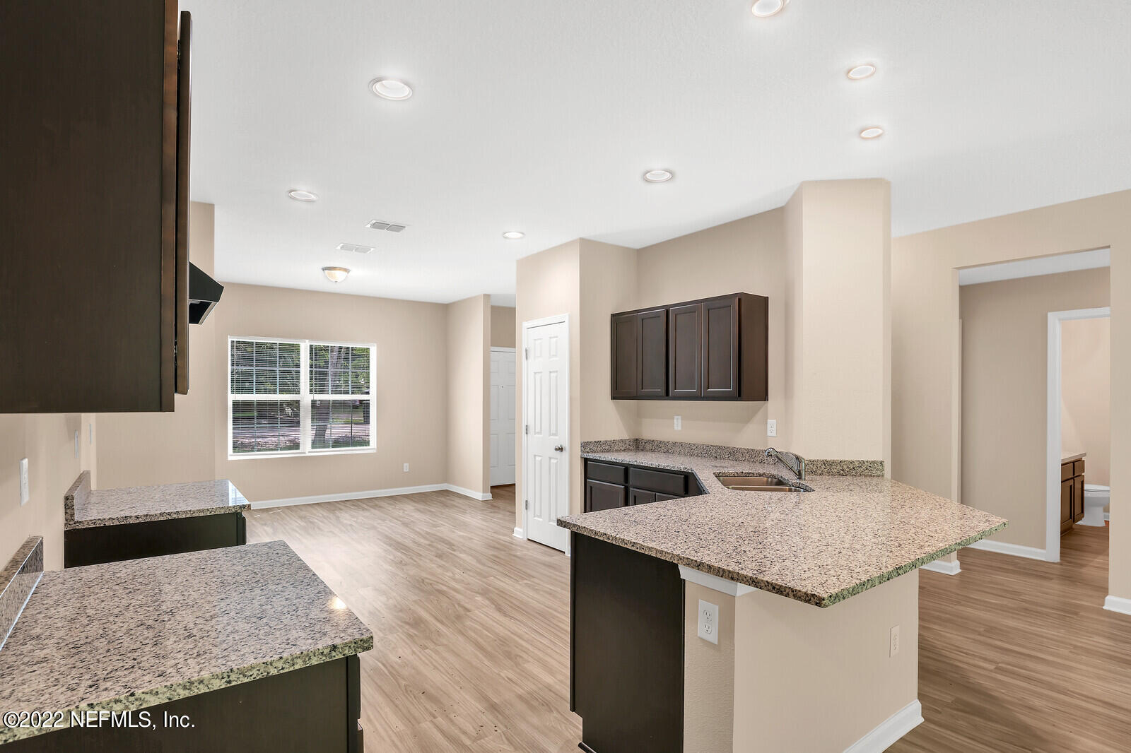 2410 Leon Road Jacksonville, FL 32246 - Photo 7 of 20 Kitchen to Dining Room