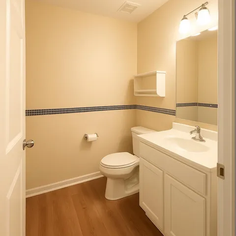 a view of a livingroom with a ceiling fan and a chandelier fan