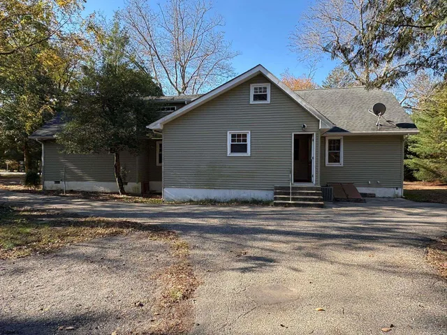 a house view with a outdoor space