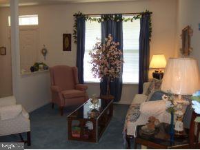 47 Quail Road Barnegat, NJ 08005 - Photo 3 of 12 a living room with furniture and a window