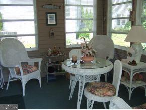 47 Quail Road Barnegat, NJ 08005 - Photo 7 of 12 a living room with furniture and a table
