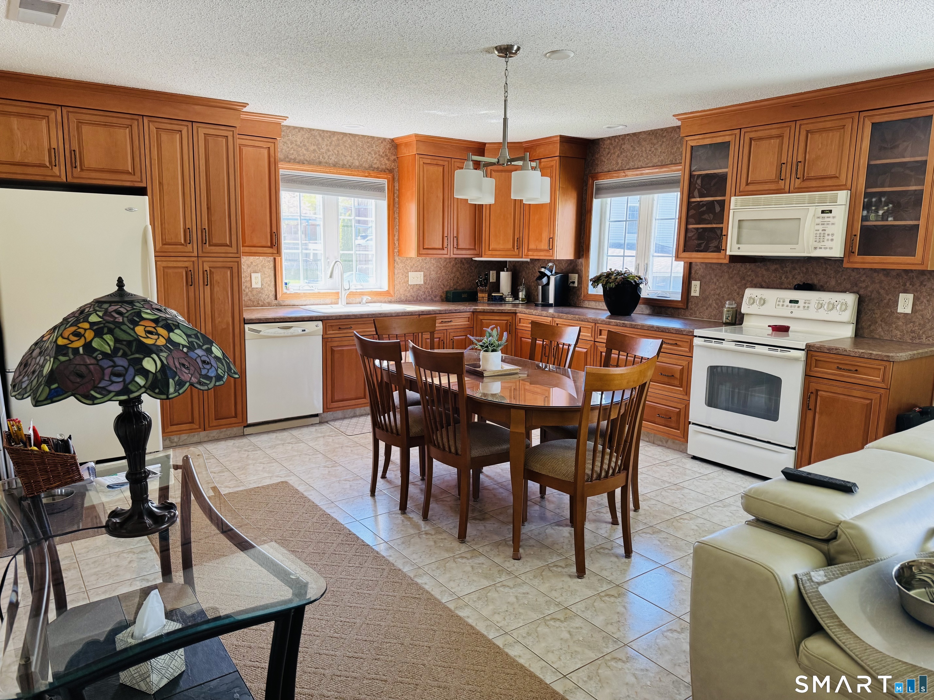 1514 Woodtick Road Wolcott, CT 06716 - Photo 18 of 23 a view of a dining room with furniture