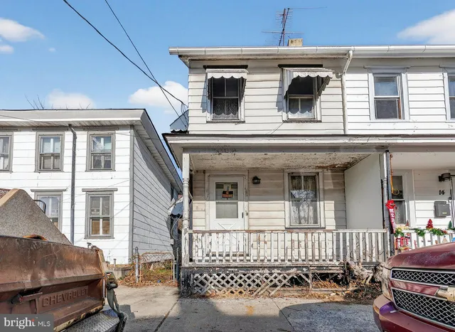 a view of a house with a porch