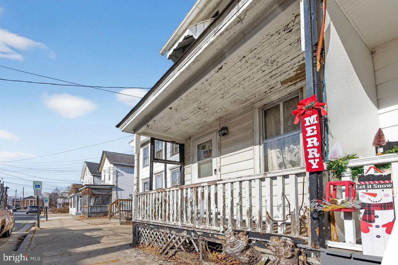 12 Church Street Salem, NJ 08079 - Photo 2 of 15 a street view with tall buildings