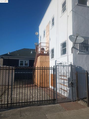 a view of a livingroom with furniture and a fireplace