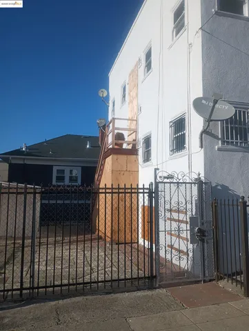 a view of a livingroom with furniture and a fireplace