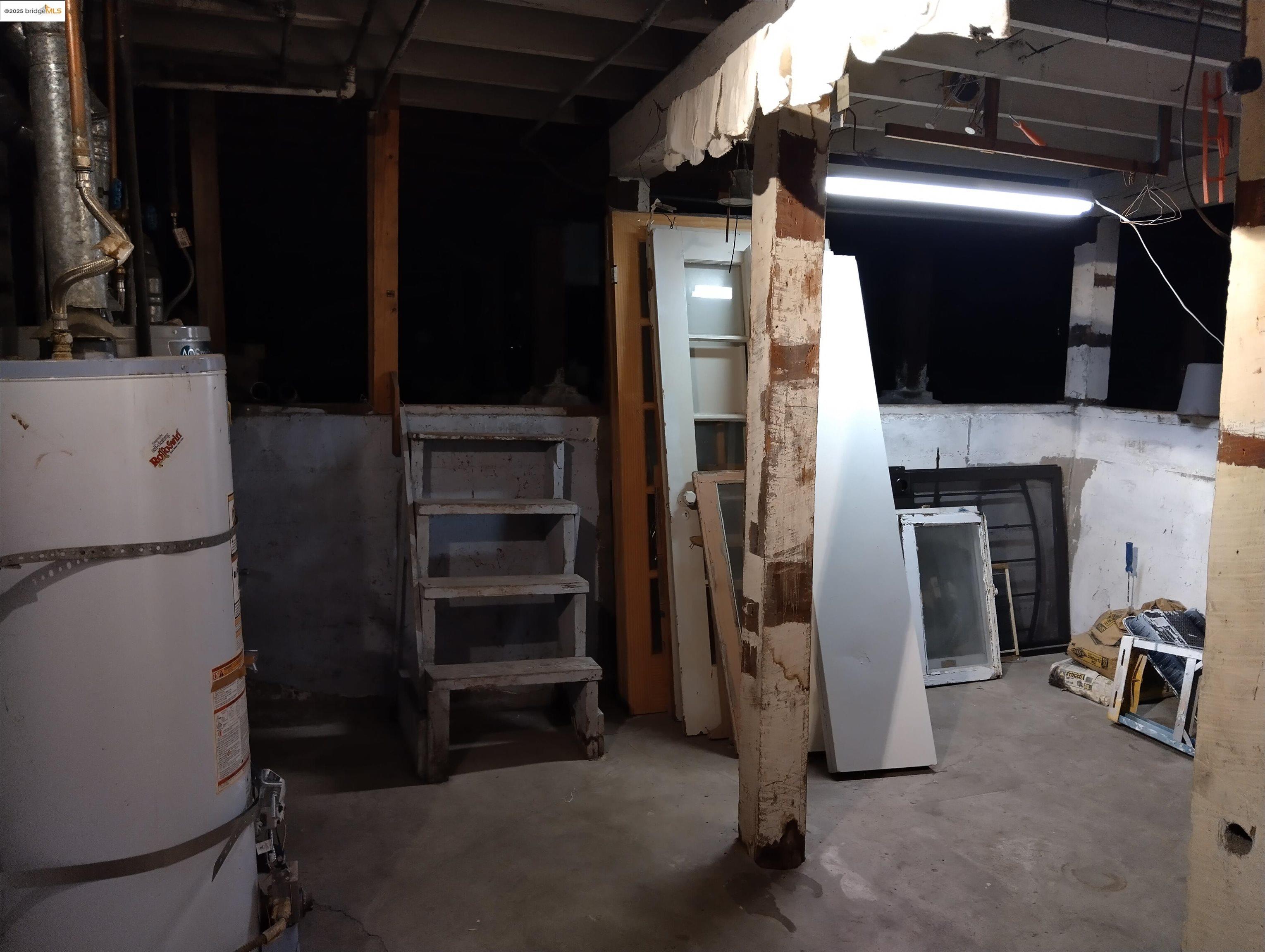 847 East 18th Street Oakland, CA 94606 - Photo 18 of 60 a view of a livingroom with furniture and a fireplace