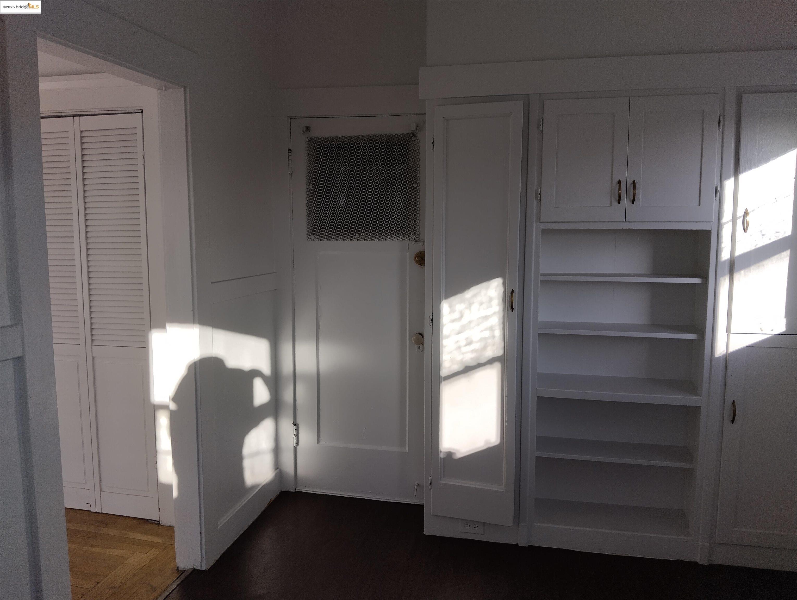 847 East 18th Street Oakland, CA 94606 - Photo 27 of 60 a view of entryway and wooden floor