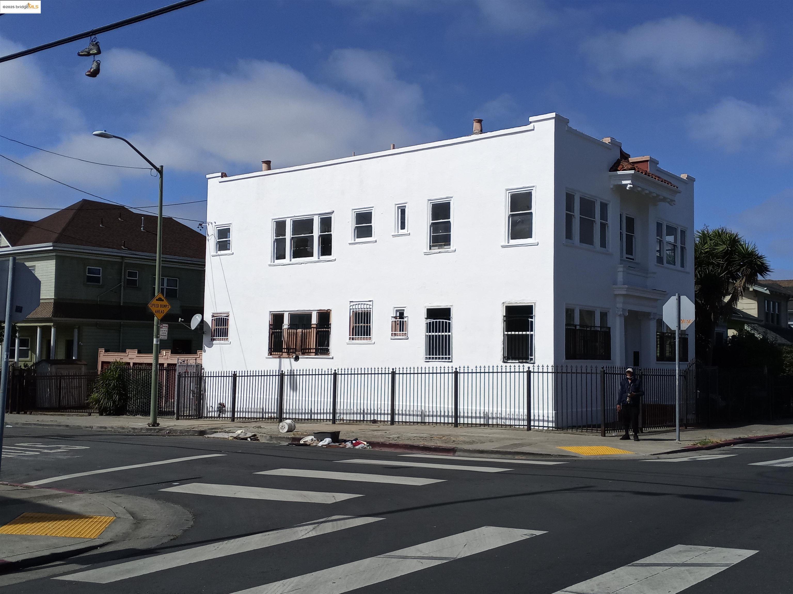 847 East 18th Street Oakland, CA 94606 - Photo 3 of 60 a view of a building in a street