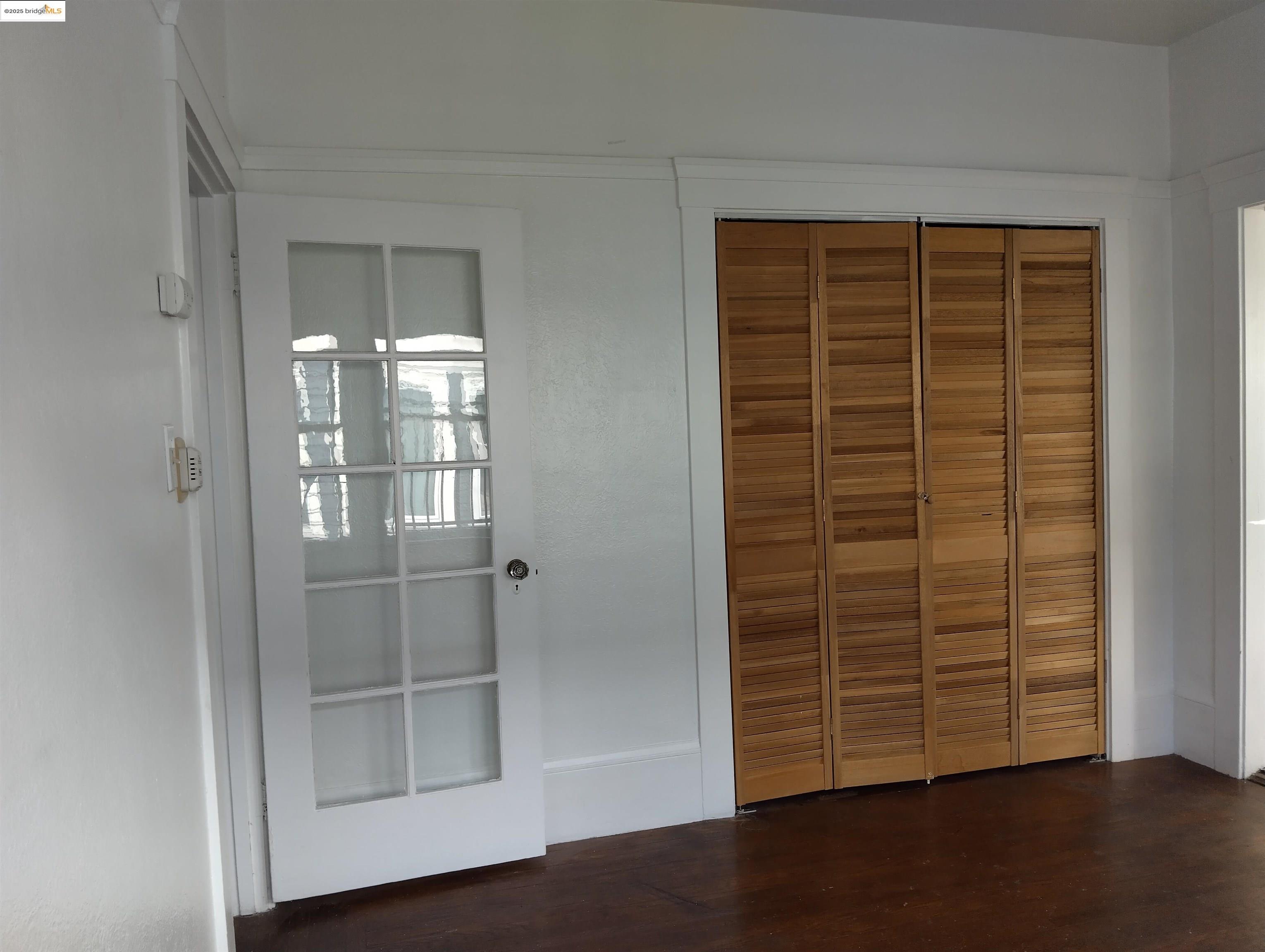 847 East 18th Street Oakland, CA 94606 - Photo 49 of 60 a view of wooden floor and windows in a room