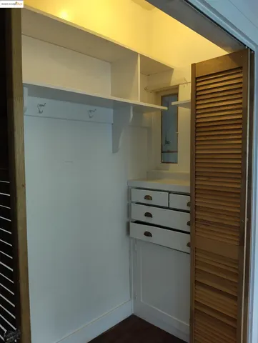 a bathroom with a sink and a window