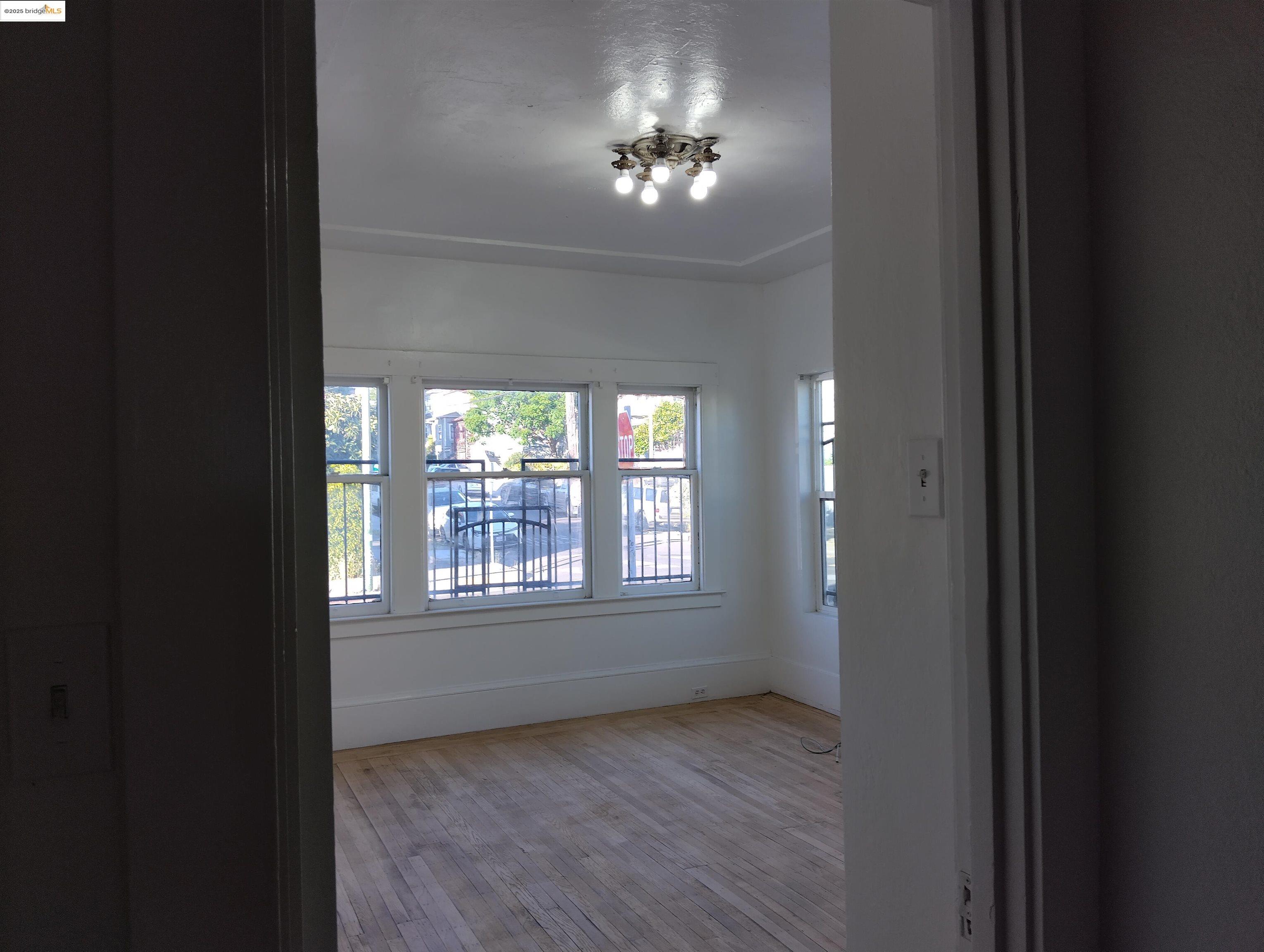 847 East 18th Street Oakland, CA 94606 - Photo 56 of 60 a view of an empty room with a window
