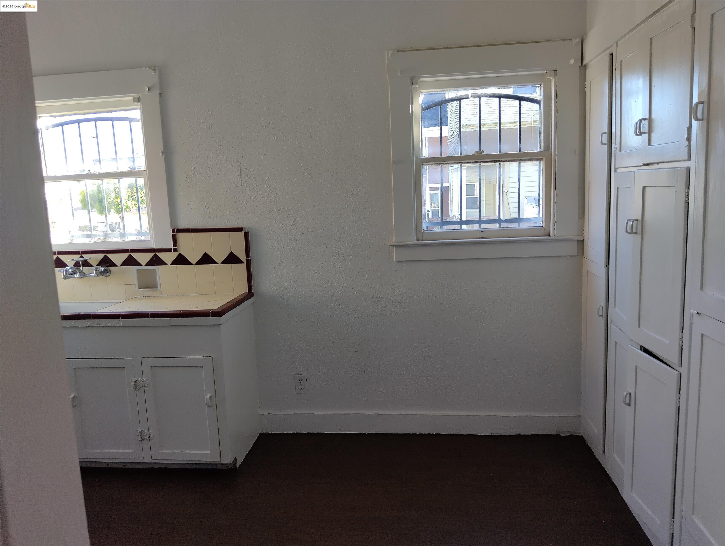 847 East 18th Street Oakland, CA 94606 - Photo 60 of 60 a bathroom with a sink and a window