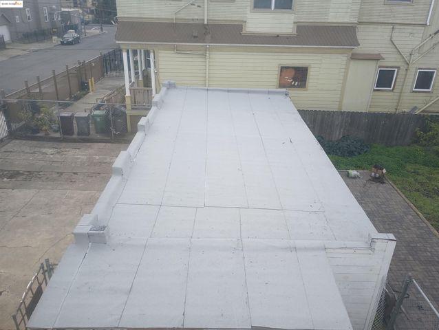 a view of a garage with parked cars