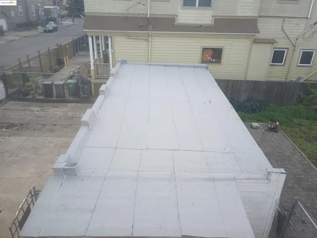 a view of a garage with parked cars