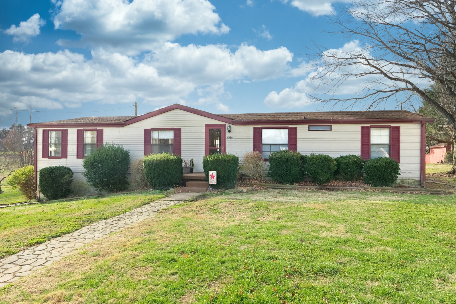 6480 Highway 161 Springfield, TN 37172 - Photo 2 of 20 a view of a house with a yard and potted plants